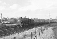 Corkerhill Jubilee 45677 <I>Beatty</I> with a <I>Starlight Special</I> passing Crookston on Sunday 1 July 1962. [Railscot note: The <I>Starlight Specials</I> were launched in 1953 to provide cheap overnight travel on summer weekends to London (usually Marylebone) and at their peak of popularity in 1960 a dozen or more were in operation. Most of the specials started from St Enoch although there were trains from Waverley, Gourock and even one for a time from Clydebank Riverside. The last <I>Starlight Special</I> ran in 1962, the year the photograph was taken.] [see image 27077]<br><br>[Colin Miller 01/07/1962]