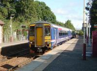 156 449 standing in the sunshine at Pollokshaws West on 8 September 2007 with a Glasgow Central - Barrhead service.<br><br>[David Panton 08/09/2007]