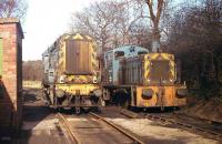 D3023/08016 has been controversially used on the Bluebell Railway works trains until recently. Here it is in 1983 in an earlier role, sold out of BR service and working at the British Oak Disposal Point, Crigglestone, near Wakefield. Alongside is 03037, also now preserved. <br><br>[Mark Bartlett 24/03/1983]