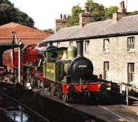 BR built J72 69023 <I>Joem</I> at the head of a lineup at Grosmont shed in 1983. Behind the J72 are Jubilee 5690 <I>Leander</I> and D821 <I>Greyhound</I>. The <I>Railway Terrace</I> has since been demolished.<br><br>[Colin Alexander //1983]