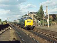 With a 27 bringing up the rear, a 37 heads an Edinburgh-Glasgow push-pull driver training run west through Linlithgow station in 1971.<br><br>[Bill Roberton //1971]