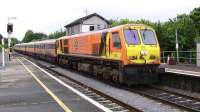 The 1828 to Waterford runs into Kilkenny station behind IE 212 on 17 May 2008. The locomotive will run round here before setting off on the final leg of its journey. <br><br>[Colin Miller 17/05/2008]