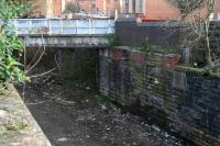 View down into the urban cutting that brought the GCDR lines round from Gallowgate and into the former terminus at Bridgeton Central. Taken in April 2007, with the camera set on timed release and held up above the wall on the end of a monopod. This was attempt number 9.<br><br>[John Furnevel 01/04/2007]