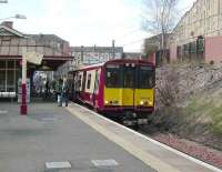 314 209 on a Newton service at Queens Park on 19 April 2008.<br><br>[David Panton 19/04/2008]