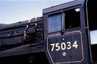 Out on one of the scrap sidings to the north of Carnforth shed BR Standard 4 4-6-0 no 75034 in remarkably clean condition languishes on 13 June 1968 awaiting its fate. Built in July 1953, withdrawn in February 1968 at Carnforth, it was cut up at TW Ward, Inverkeithing 5 months later.<br><br>[John McIntyre 13/06/1968]