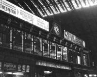 <I>All passenger trains which are at present operating from this station will arrive at and depart from Central Station Glasgow on and from Monday 27 June 1966.</I> Message to passengers on the last quiet Sunday afternoon at St Enoch, with the time at 4.20pm on the station clock... on a brighter note, other signage invites us to open a copy of <I>Photoplay</I>, pour ourselves a glass of <I>Standfast</I> and light up a <I>Bristol!</I><br><br>[Colin Miller 26/06/1966]