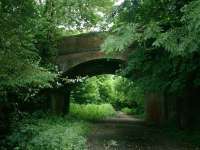 Kingsmeade Road overbridge on the L&SWR Meon Valley Line north of Wickham.<br><br>[Alistair MacKenzie 19/06/2008]