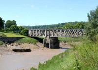 The remains of Ashton Swing Bridge, in the old port area of Bristol on 19 June 2008. The bridge, which once carried both road and rail links, last swung in the 1930s and was last used by the Railway in the mid-1990s. Track still exists on the bridge but without connections at either end. The bridge is now part of a cycle track and walkway.<br><br>[Peter Todd 19/06/2008]