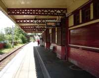 The generous canopy at Muirend station seen on 14 June looking towards Neilston.<br><br>[David Panton 14/06/2008]