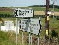 Road sign by Forteviot level crossing on 22 August 2007. All 6 locations boasted a railway station at one time... only one remains.<br><br>[David Panton 22/08/2007]