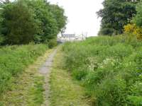 Looking north at the site of Rothienorman station on the Inveramsey - MacDuff branch. The edge of the down platform can still be seen, with the trackbed on the right having been in-filled.<br><br>[John Williamson 22/06/2008]