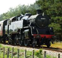 Standard class 4 Tank 80105 looking good at the head of a five coach train on its way to Broomhill.<br><br>[John Gray 23/06/2008]