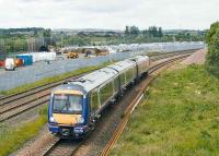 Newcraighall service leaving Bathgate on 23 June 2008 passing various signs of forthcoming engineering works. <br><br>[James Young 23/06/2008]