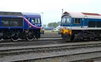 66713 looking sharp in <I>First</I> colours faces Yeoman 59102 at Merehead depot during the East Somerset Railway 150 Gala Day on 21 June.<br><br>[Peter Todd 21/06/2008]