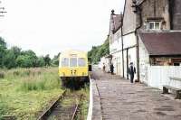 A Met Cam 101 DMU stands at Alston after arriving from Haltwhistle on a trip I made shortly before closure of the branch. [See image 7147] to see the remarkable contrast to the same scene in 1952 although of course things have improved again with preservation. <br><br>[Mark Bartlett //1976]