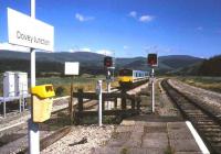 A DMU from Barmouth comprising a pair of class 150s leaves Dovey Junction for Machynlleth in July 1989.<br><br>[Ian Dinmore 19/07/1989]