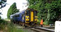 153359 on an Ormskirk to Preston service comes to a stand at Midge Hall SB as the signalman prepares to receive the token for the section from Rufford on 24 Jun 2008. A local group is lobbying for the reopening of Midge Hall station using the slogan <I>Youve stopped<br>
the train, now let us get on.</I> [When the station closed in 1961 there was a sparse population in the area. Since then major housing development has taken place with more in the offing on the  nearby former Leyland Trucks vehicle test track.]<br><br>[John McIntyre 24/06/2008]