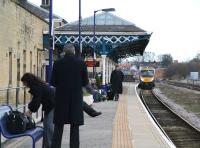 Platform view east at Malton on 2 April 2008 showing the canopy that originally stood at Whitby but was relocated here in the mid 1990s following demolition of the overall roof [see image 32942]. A TransPennine service for York, Leeds, Manchester and Liverpool (something for everybody there surely?) is approaching the platform. <br><br>[John Furnevel 02/04/2008]