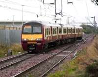 <I>Not in service</I> 320 309 uses the crossover at Shettleston, heading for the loop used for reversing, on 15 September 2007<br><br>[David Panton 15/09/2007]