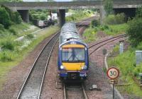 An Edinburgh - Dundee train on the climb towards the Forth Bridge on 26 June 2008 photographed running through Dalmeny Junction. <br><br>[John Furnevel 26/06/2008]