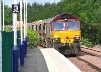 Engineering occupation at Uphall on 29 June 2008. View west with EWS 66008 on a PW train.<br><br>[John Furnevel 29/06/2008]