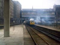 A Swindon DMU leaves Aberdeen for Inverness in May 1979, accompanied by the usual <i>smokescreen</i>.<br><br>[John Williamson 12/05/1979]