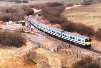 The <I>Cambrian Coast Express</I> (or most of it) calls at Morfa Mawddach in 1986. The now closed route inland via Dollgellau ran off to the left.<br><br>[Ian Dinmore //1986]