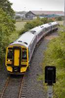 158 732 and 158 741 form the 14.55 Dunfermline Town-Dundee service via Kirkcaldy during the temporary timetable on Sunday 6 July.  The train is approaching Inverkeithing East Junction on the little used north/east chord.<br><br>[Bill Roberton 06/07/2008]