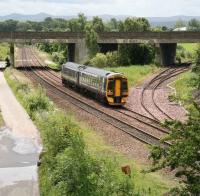 Fife bound 158 about to pass Dalmeny North Junction on 26 June 2008. The line from Winchburgh Junction is on the right with the trackbed of the South Queensferry branch, now a cycleway, on the left. Dalmeny Junction signal box stood in the bottom centre of the picture [see image 4166].<br><br>[John Furnevel 26/06/2008]