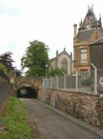 View north along the route of the Alloa Wagonway on 2 July towards the Station Hotel  and ring road, showing the <I>underpass</I> now running below Drysdale Street/Mar Street. When first built, the route would have appeared much less hemmed in by its surroundings. Both the 1863 Alloa Sheriff Court building (on the right) and the 1851 Moncrieff United Free Church (beyond) were built a considerable time after the 1760s wagonway.<br><br>[John Furnevel 02/07/2008]