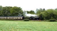 Great Western Railway 3440 <I>City of Truro</I> slows its train on the approach to Cholsey station on the Cholsey & Wallingford Railway on 29 June, seen from Cholsey churchyard.<br><br>[Peter Todd 29/06/2008]