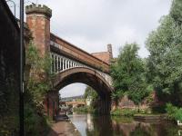 View west along the Bridgewater Canal at Deansgate, Manchester, on 7 July 2008. In the middle distance, through the arch of the railway bridge, the masts of the Trafford Park/Warrington line can be seen, while running above that is the CLC/Metrolink elevated section, on the approach to G-Mex/Central station, out of the picture to the northeast.     <br><br>[Mark Bartlett 07/07/2008]