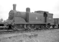 One of the beautiful McIntosh 2P 0-4-4 tanks stored alongside Stirling South shed in May 1959. The example in question is 55222, for many years the regular locomotive on the Killin branch.  <br><br>[Robin Barbour Collection (Courtesy Bruce McCartney) 19/05/1959]