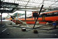 Accident at Largs on 11 July 1995 involving the 0615 service from Glasgow Central. <I>The trains brakes failed, it hit the buffers, jumped 3 feet in the air, ran on through the station, then through the shops on Main Street.</I> [Witness statement at the time]. Remarkably there were no serious injuries...but Largs station was never the same again!<br><br>[Colin Miller 11/07/1995]
