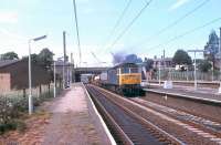 47358 hauls a very mixed freight towards Euxton Junction on the Up Slow line through Leyland in the Summer of 1981.  <br><br>[Mark Bartlett 29/06/1981]