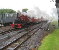 21st Century Hunslet <I>Statfold</I> arrives back at Woody Bay in driving rain with a train from Killington Lane on 05 July 2008.<br><br>[John McIntyre 05/07/2008]