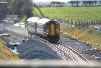 A Glasgow - Newcastle DMU between Rigg and Gretna Green on 4 April 2008. The works are in connection with the redoubling of the route between Gretna and Annan.<br><br>[John Furnevel 04/04/2008]