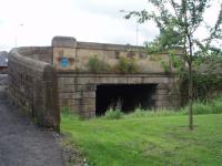 Stone Bridge lies a few hundred yards to the Preston side of the former Longridge terminus [see image 18466]. The bridge supports a busy roundabout and has been filled in on the far side. The blue plaque, placed by the Longridge Heritage Committee, reads:<I> Stone Bridge. Constructed in 1847 using cast iron girders with brick infill arches to support the road, the bridge spanned the Preston to Longridge Railway. The first steam train to use the line was on the 12th June 1848. The line closed to passenger traffic in June 1930 and goods traffic ceased in October 1967</I>.<br><br>[Mark Bartlett 15/07/2008]