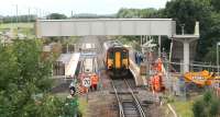 The 1043 service to Carlisle (ex Glasgow Central) calls at Gretna Green on 17 July. Work on the new platform and footbridge is well advanced and preparations are being made to complete the final section of double track during the 2 week complete closure of the line commencing on Saturday 19 July 2008. <br><br>[John Furnevel 17/07/2008]