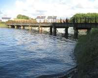 With the River Taw on the left and behind the camera, this south facing photograph, taken on 3 July 2008, shows the original railway bridge over the creek at Fremington. The station is off to the left.<br><br>[John McIntyre 03/07/2008]