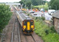 The 1043 departure for Carlisle sets off from the rapidly expanding 1993 Gretna Green station on 17 July 2008 on the final 13 minute leg of its journey. On the extreme right stands part of the refurbished 1848 G&SW station building, (now a private house), closed to passengers in 1965. [See image 6726]<br><br>[John Furnevel 17/07/2008]