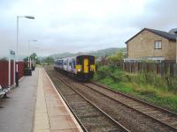 When Langho reopened in 1994 housing development precluded the reinstatement of the up platform and a staggered arrangement was introduced. This view from the original down platform is towards Whalley as 150272 arrives on a Clitheroe to Manchester Victoria service. <br><br>[Mark Bartlett 17/07/2008]
