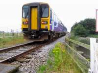 The 1825 Preston to Ormskirk crosses the River Douglas and enters the loop at Rufford on 18 July 2008.<br>
<br><br>[John McIntyre 18/07/2008]