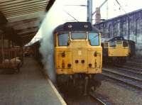 31229 at Carlisle on a dull and overcast 26 May 1982. In the background 27024 stands in the sidings on the west side of the station.<br><br>[Colin Alexander 26/05/1982]