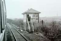 View of Clayton West signal from a Derby 108 dmu leaving the branch terminus for Huddersfield. The box controlled access to the coal mine as well as the single track section down to Skelmanthorpe. <br><br>[Mark Bartlett 17/01/1981]