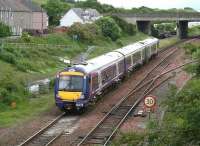 Southbound service passing Dalmeny North Junction on 26 June with the spur from Winchburgh coming in on the right.<br><br>[John Furnevel 26/06/2008]