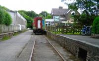 Looking south along the platform at the old Torrington station on 3 July 2008. The station building is now <I>The Puffing Billy</I> public house, as evidenced by the sign hanging from one of the former platform lamp posts.<br><br>[John McIntyre 03/07/2008]