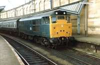 A class 31 with a train in the Newcastle & Carlisle bay at the south end of Carlisle station circa 1983. <br><br>[Colin Alexander //1983]