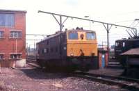 Last built EM1 76057, formerly named <I>Ulysses</I> and taken into service in August 1953, stands withdrawn at Reddish depot in 1978. As a vacuum only example it was taken out of use in February 1977 but must have been a source of spares because it was not cut up until 1983, along with those 33 locos that survived until the closure of the Woodhead route. 76040 standing alongside was one of these, being finally withdrawn in July 1981. <br><br>[Mark Bartlett /06/1978]