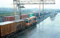 Scene at North Wall container depot, Dublin, on a wet afternoon in 1993.<br><br>[Bill Roberton //1993]